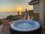 Sunset Sky Roof top Hot tub and Lounge 